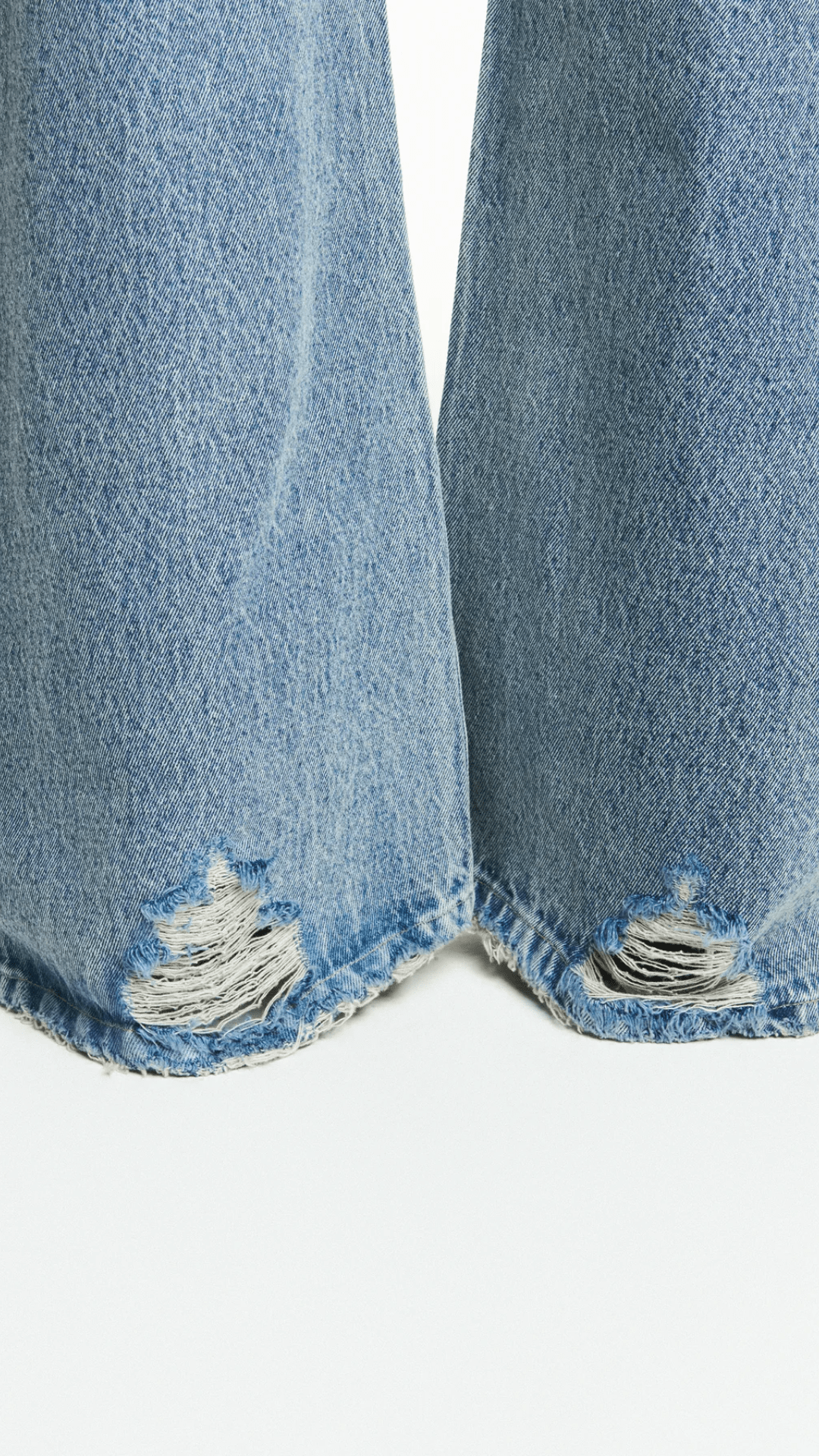 Calça Jeans Flare Rasgos Cintura Baixa Costura Lateral